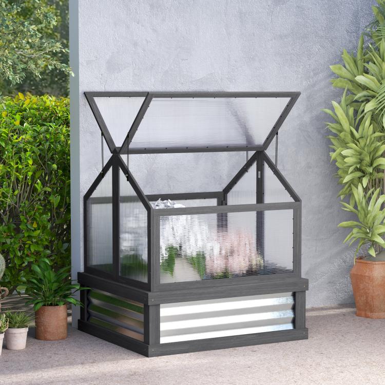 Gray raised cold frame greenhouse with clear panels and open roof