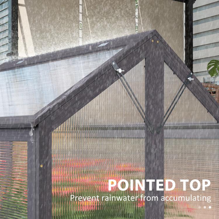 Gray greenhouse cold frame with pointed top and clear side glazing
