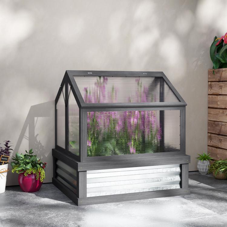 Gray raised greenhouse cold frame planter with clear panels and open roof