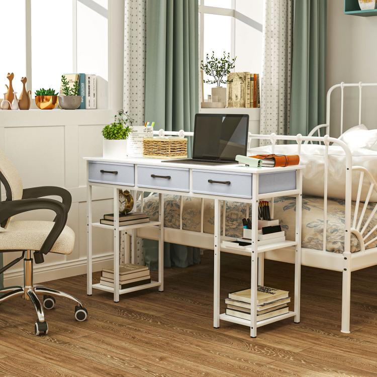 White small writing desk with three fabric drawers and open shelving under top