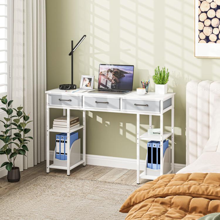 White desk with three drawers and open shelving under the desktop