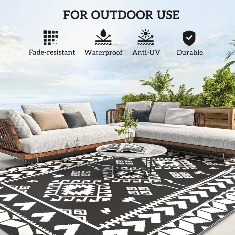 Outdoor rug with black-and-white geometric pattern for outdoor use