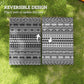 Reversible black-and-white geometric outdoor rug, two pattern sides