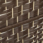 Detail of brown woven privacy screen with light vertical and horizontal fibers