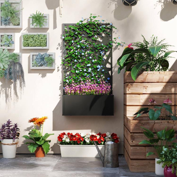 Black metal wall-mounted planter box with decorative privacy screen and potted plants