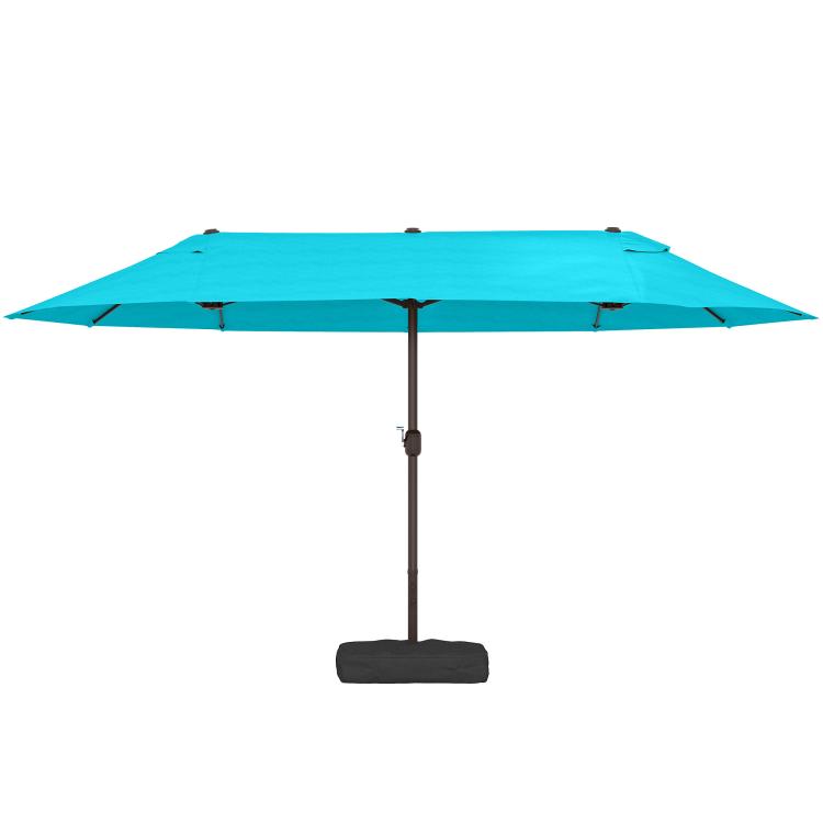 Blue outdoor market umbrella with open canopy on crank lift pole and base