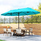 Blue patio market umbrella with outdoor dining table and chairs underneath