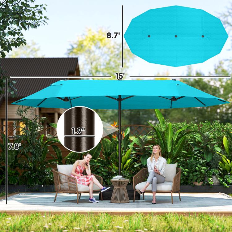 Blue patio market umbrella canopy with support pole and circular crank control