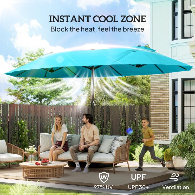 Blue patio market umbrella providing shade over outdoor sofa seating