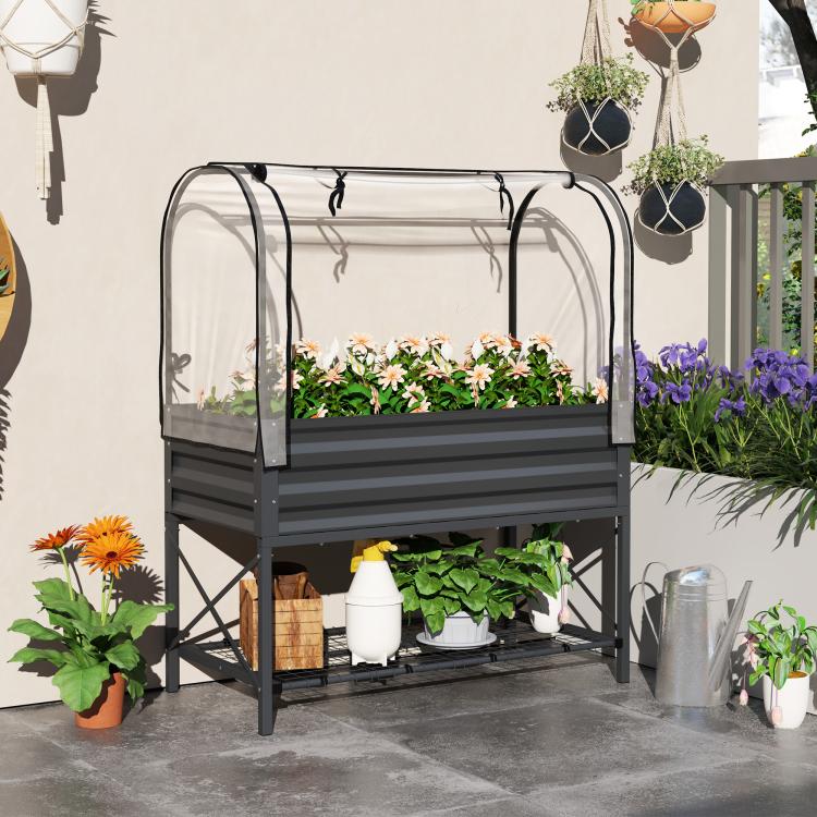 Dark gray raised garden bed planter with clear arched cover and lower grid shelf