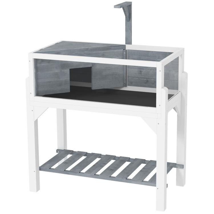 Gray wooden tortoise enclosure with clear front panels and side compartments, plus bottom shelf