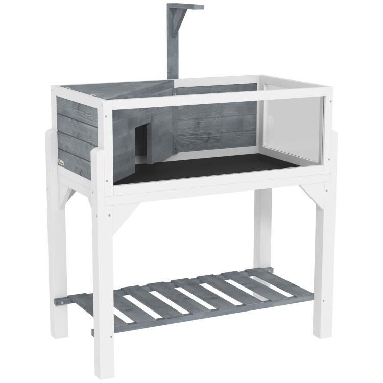 Gray wooden tortoise enclosure with open front panel and slatted bottom shelf