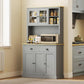 Gray freestanding pantry cabinet with glass upper doors, open microwave shelf, and two storage doors