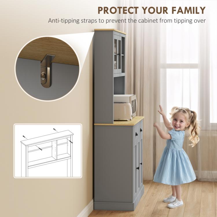Gray freestanding pantry cabinet with anti-tipping strap and door hardware