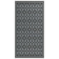 Reversible outdoor rug panel in gray with repeating quatrefoil lattice pattern