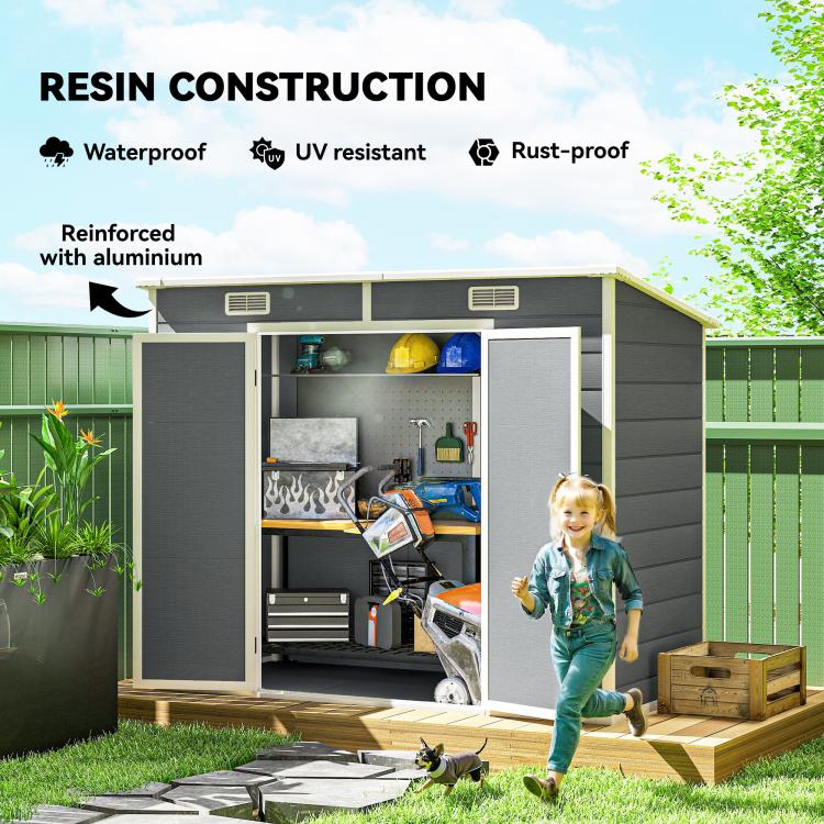Gray plastic storage shed with open double doors, vents, and tool shelves
