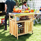 Natural wood grill cart with stainless steel cooking top, open shelves, and cabinet storage doors