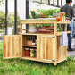 Wood outdoor kitchen island with stainless steel top, open shelf storage, and cabinet compartments