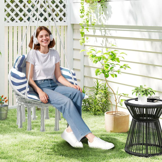 Blue-and-white striped hammock swing chair with cushion, tassels, and hanging rope