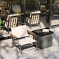 Square outdoor side table with woven gray wicker frame and dark tabletop