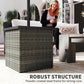 Square woven side table with dark top in mixed-gray wicker finish.