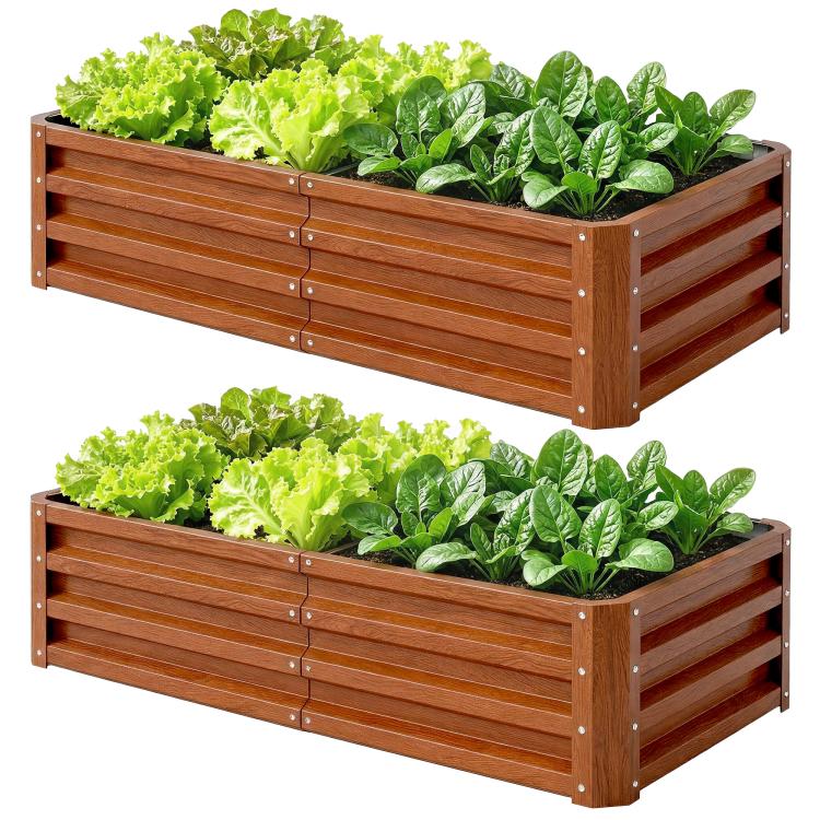 Brown wooden raised garden bed with slatted sides, filled with leafy greens plants