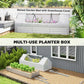 White raised garden bed with clear greenhouse cover for plants, outdoor use