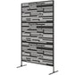 Black metal privacy screen on two stand legs with geometric horizontal slat pattern