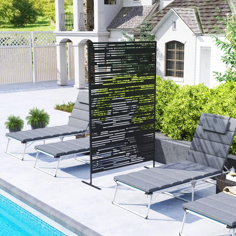 Black metal freestanding privacy screen with geometric horizontal cutout design