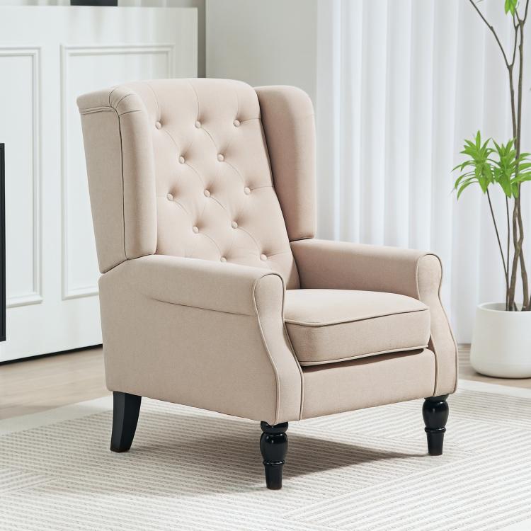 Beige upholstered wingback accent chair with button-tufted back and rolled armrests