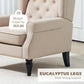Beige armchair with dark eucalyptus legs and curved arms; weight capacity label shown
