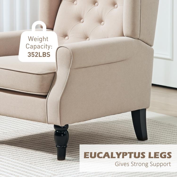 Beige armchair with dark eucalyptus legs and curved arms; weight capacity label shown