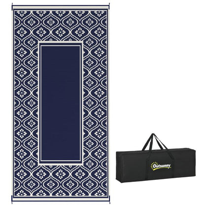 Outdoor rug with blue-and-white gourd border and included black carry bag