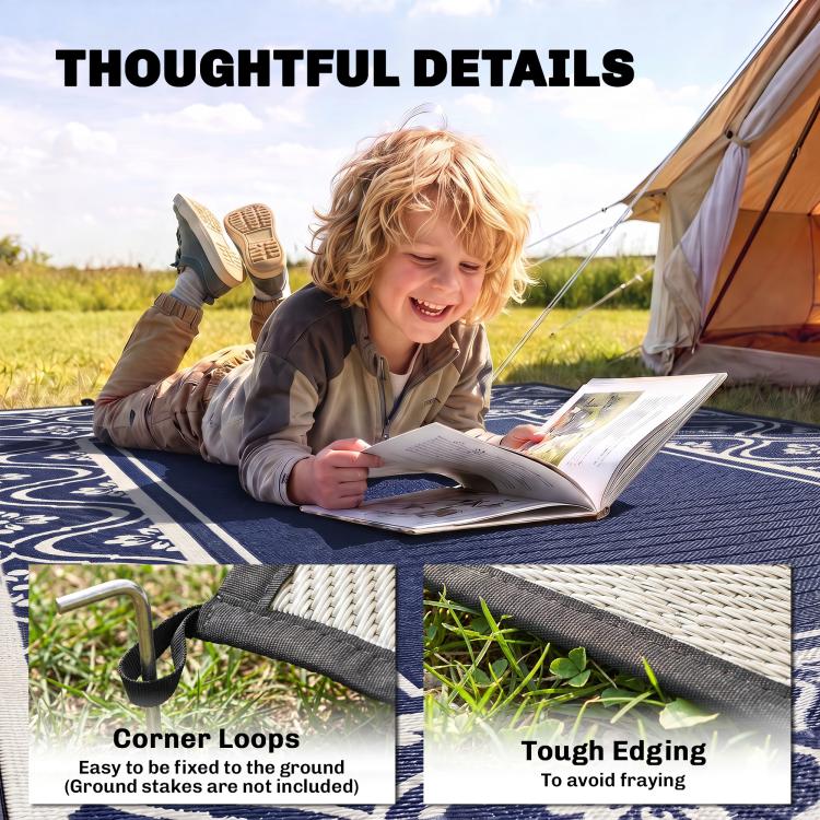 Outdoor rug with navy-and-white gourd pattern and stitched edging, child reading outdoors