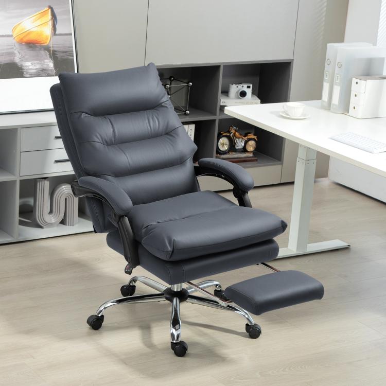 Dark gray reclining office chair with cushioned seat and extended footrest platform