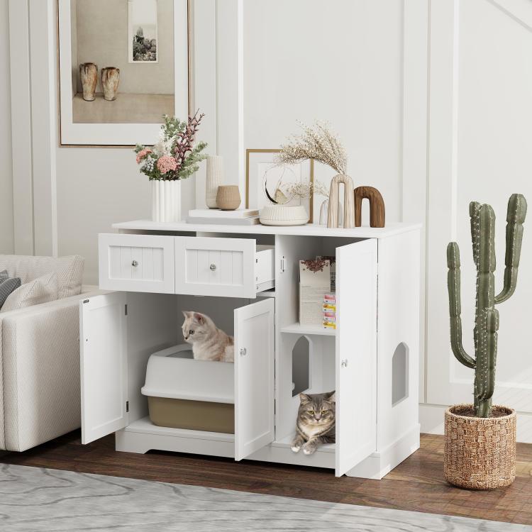 White cat litter box enclosure with open door revealing litter access and storage