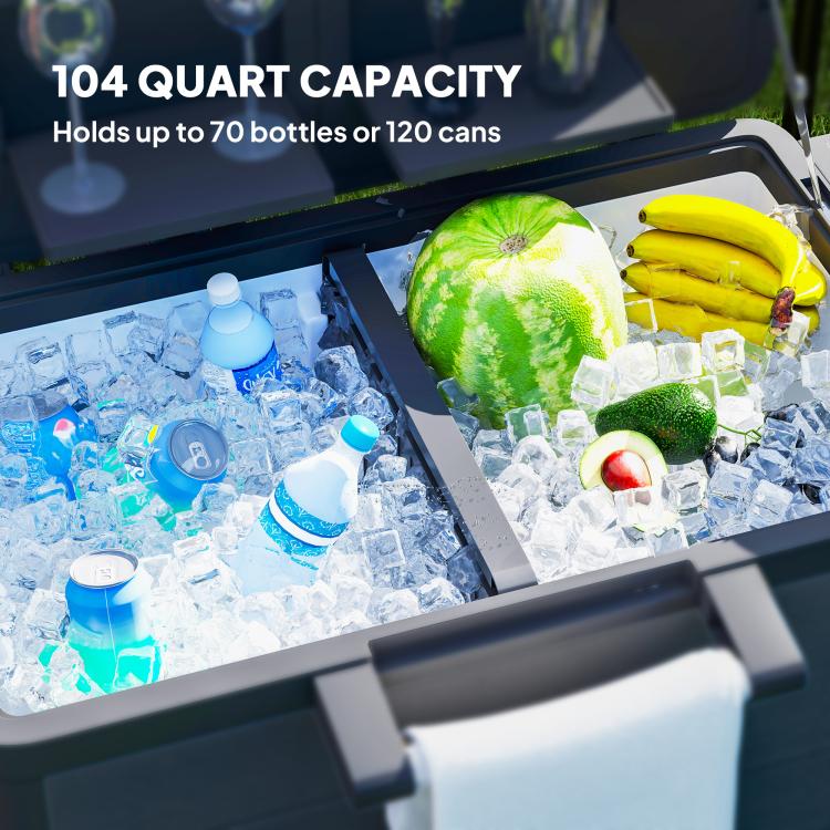 Black cooler bin filled with ice and drinks, open lid on rolling cart.
