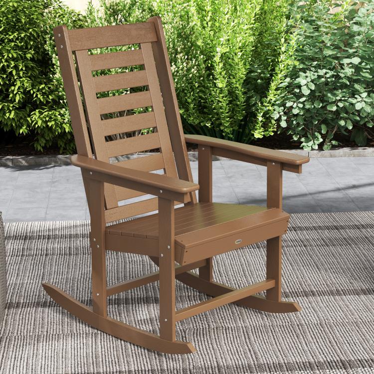 Brown high-back rocking chair with slatted seat and back, wide armrests
