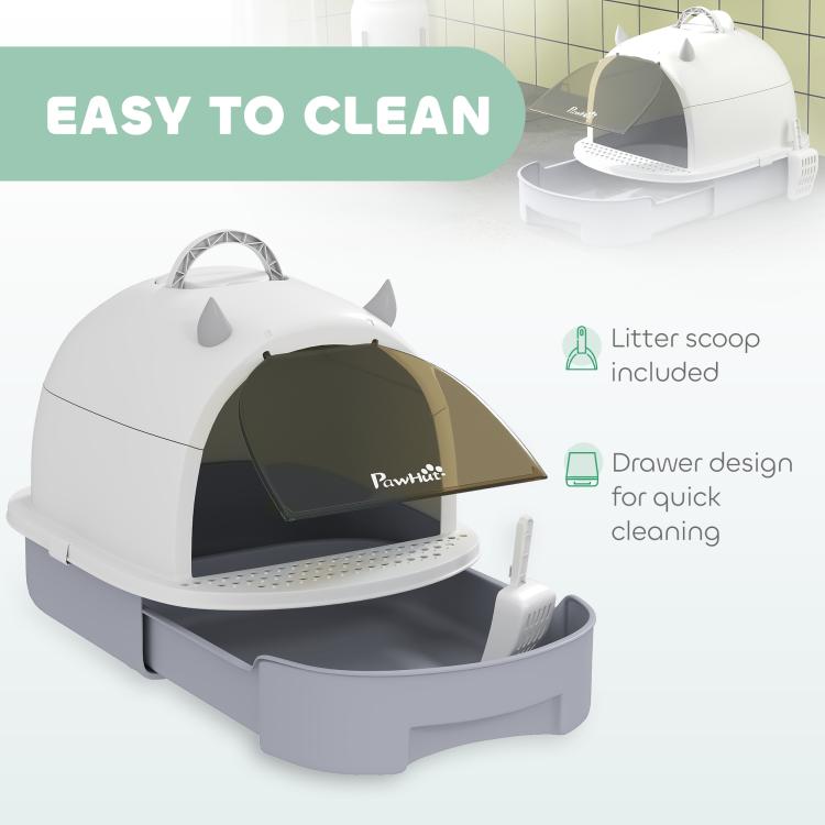 Covered cat litter box with lid, dark privacy door, and scoop included for cleaning