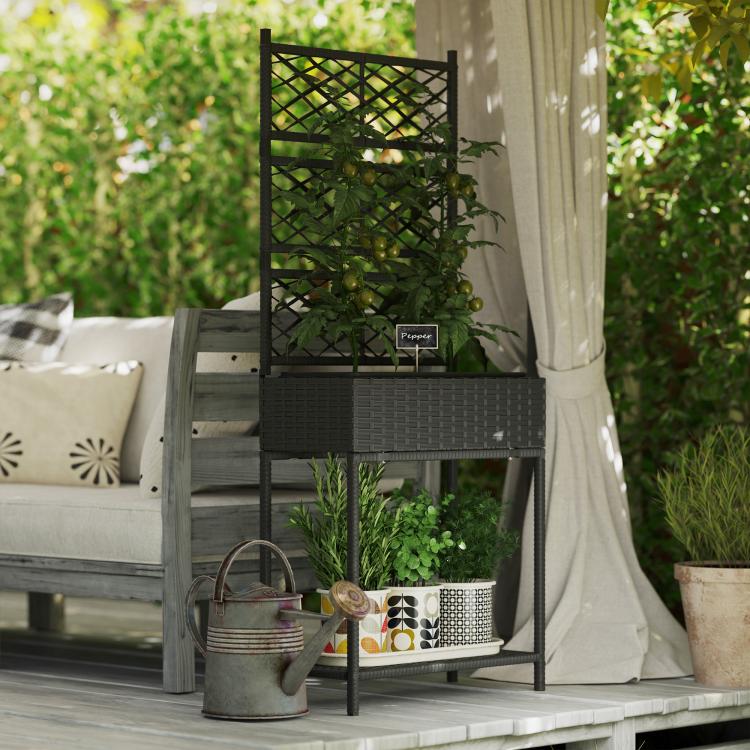 Black wicker planter with trellis and green climbing plants, freestanding with bottom shelf