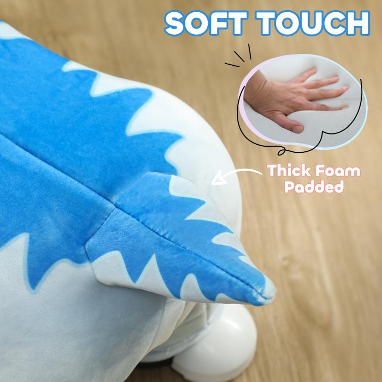 Blue and light blue plush dinosaur seat pad with thick foam padding detail.