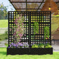 Black raised garden bed planter with lattice trellis and flowering climbing plants