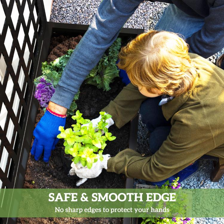 Hands planting in black raised garden bed planter with tall trellis