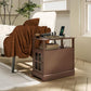 Brown side end table with charging top, open shelf, and cabinet storage beside sofa