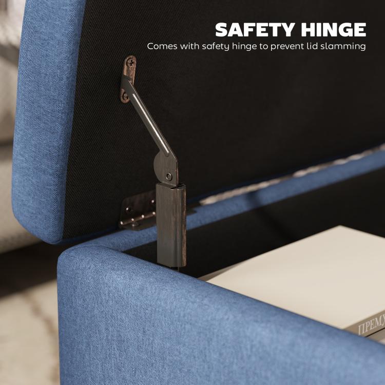 Close-up of blue ottoman flip-top safety hinge on the open lid