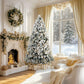 Flocked prelit artificial Christmas tree with clear lights, snowy white foliage