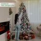 7.5 ft flocked prelit Christmas tree with clear lights and red/gold ball ornaments