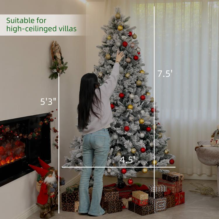 7.5 ft flocked prelit Christmas tree with clear lights and red/gold ball ornaments
