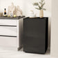 Black mini single-door refrigerator with top closed, freestanding design.