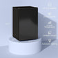 Black mini single-door refrigerator with freezer, closed on a small round base.